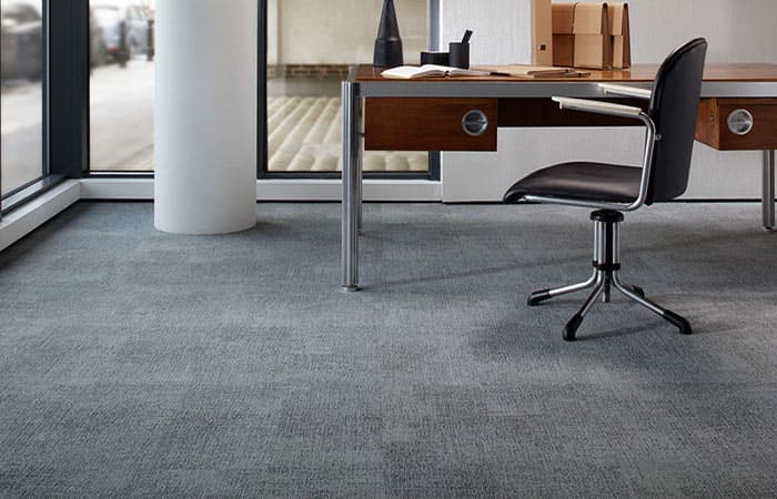 Reclaimed carpet tiles