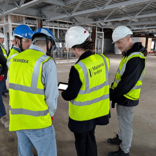 Material Index and Skanska teams in hi-vis reviewing the audit app on site at British Land's 1 Appold Street