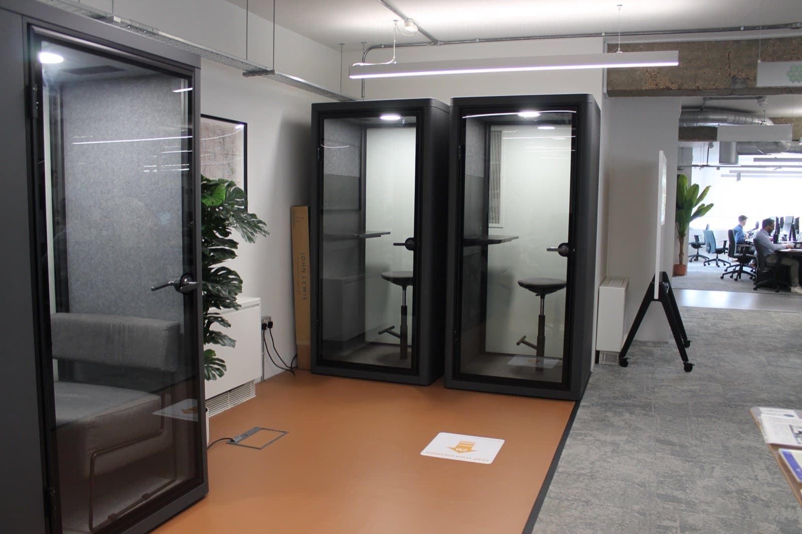 Two reclaimed acoustic meeting pods at the Geovation Hub