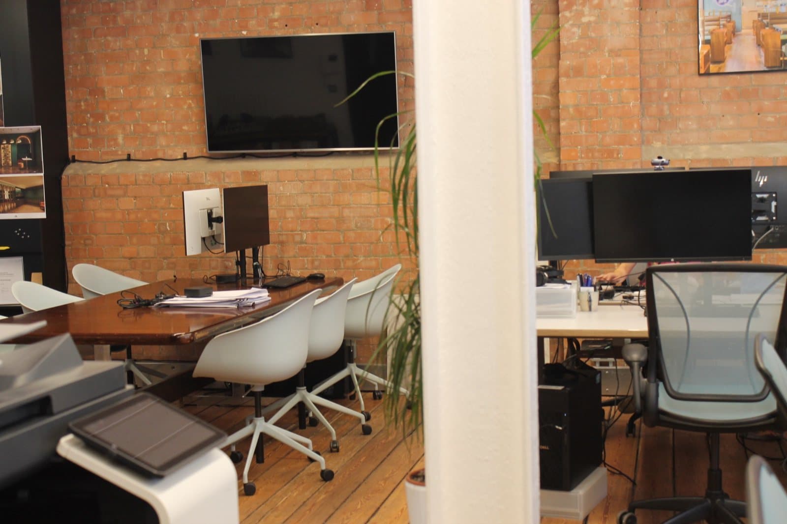 Reclaimed task chairs and meeting chairs across Mailen Design's studio