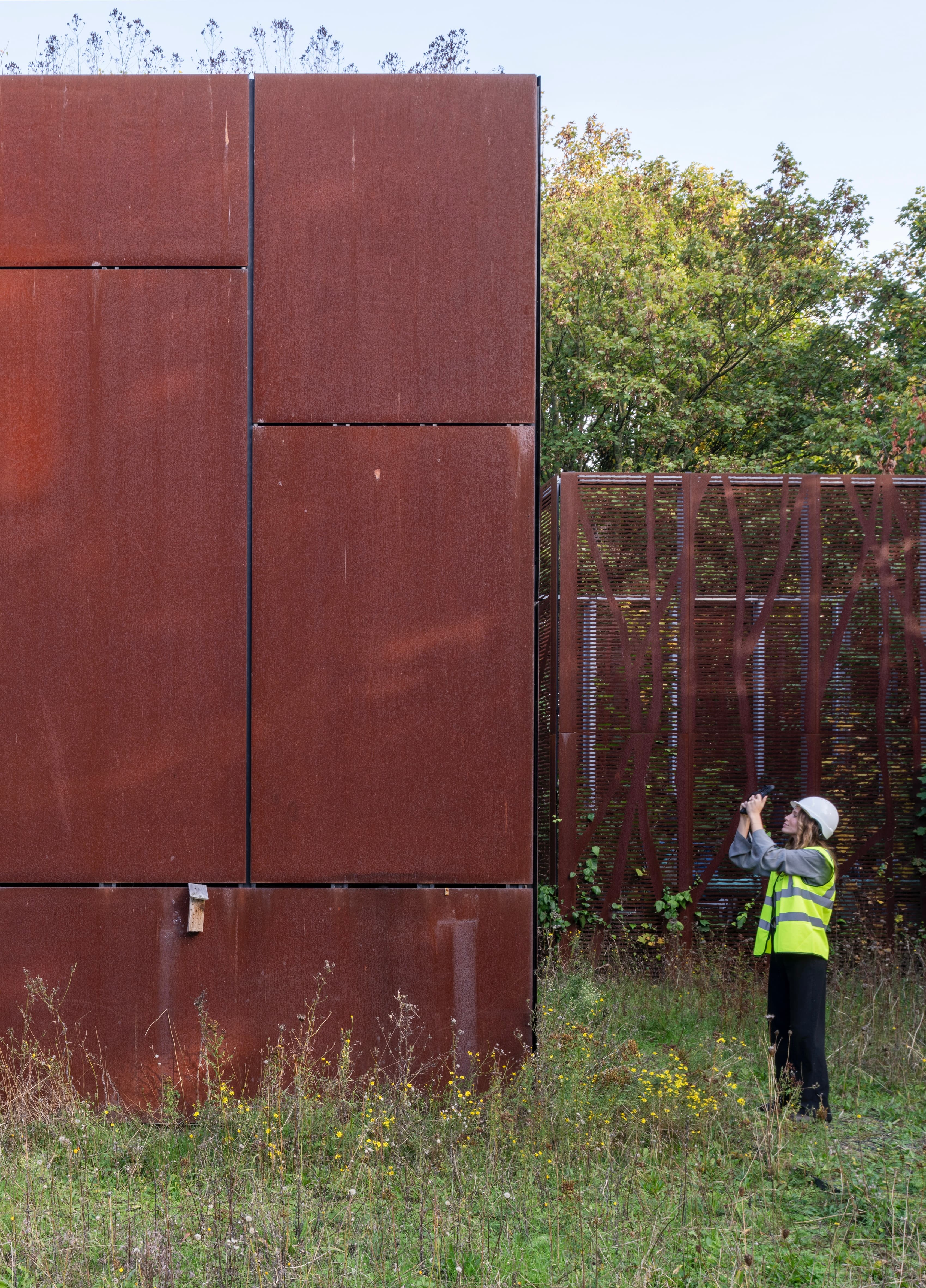 Material Index auditor surveying a building before demolition