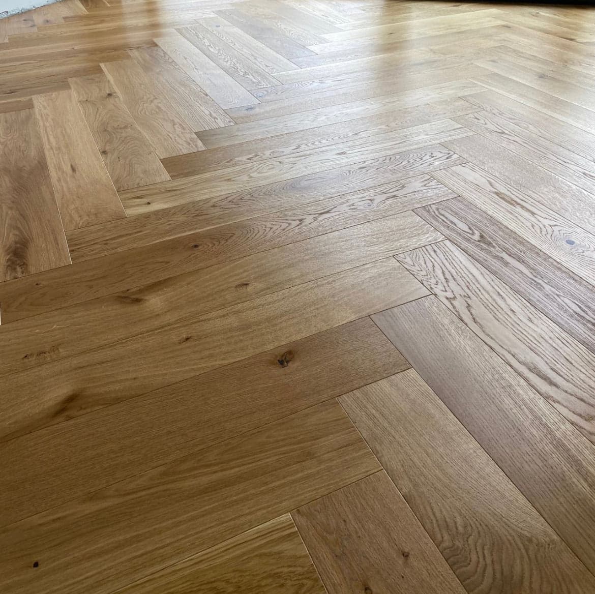 Oak Lacquered Herringbone Flooring