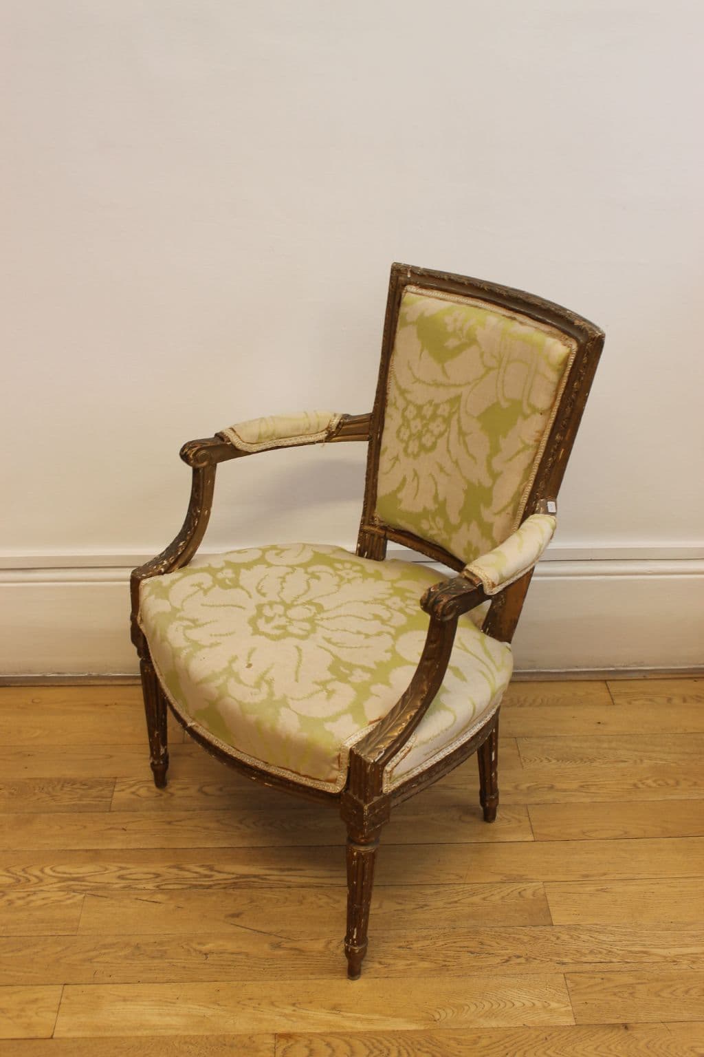 Louis XIV-style chair with armrests and fabric seat