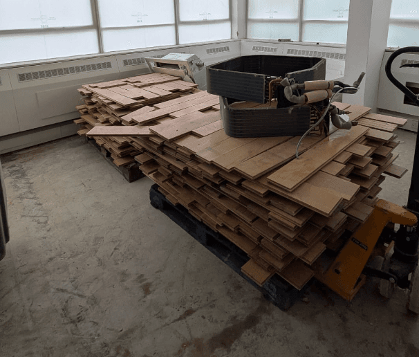 Reclaimed American oak floorboards lifted and bundled